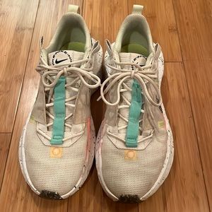 White/pink/mint green Nike tennis shoes